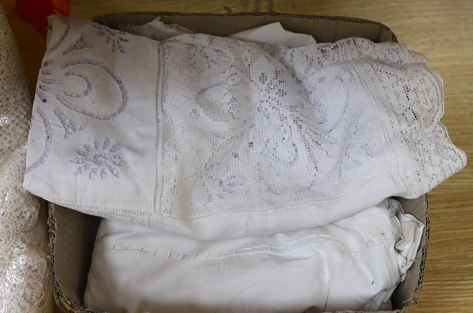 A patch worked filet lace and anglais cut work table cloth and six matching napkins, and another cloth
